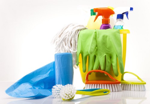 A professional Greenwich carpet cleaning service finishing safely