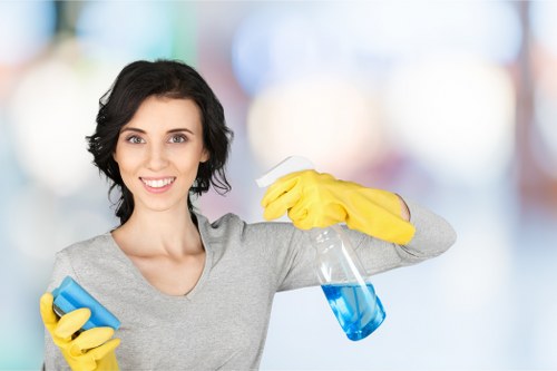 Team member preparing carpet cleaning equipment safely