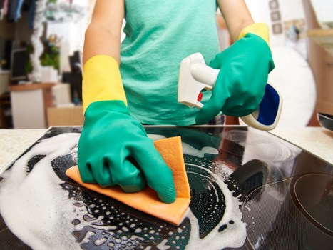 Staff member using carpet cleaning machine with care